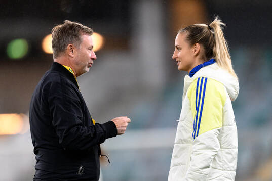 Head coach Peter Gerhardsson and Nathalie Björn of Sweden