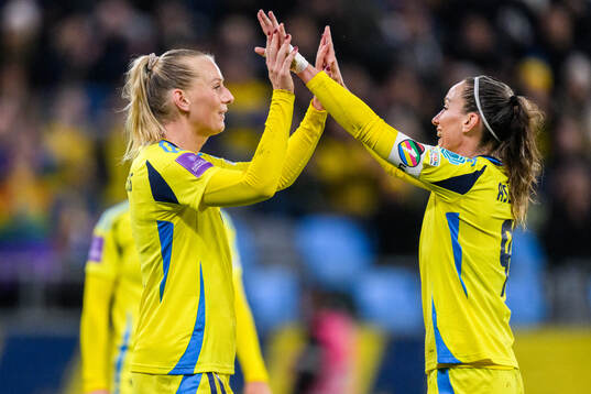 Stina Blackstenius and Kosovare Asllani of Sweden celebrates