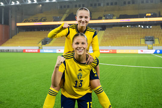 Fanny Peterson and Mollie Josefsson of Sweden celebrate