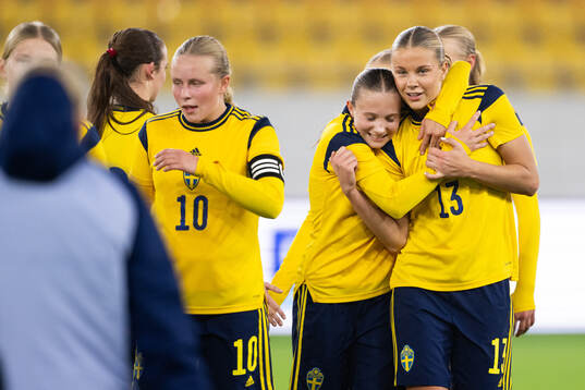 Fanny Peterson and Mollie Josefsson of Sweden celebrate