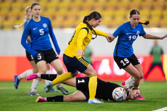 Filippa Sjöström of Sweden and goalkeeper Irina
