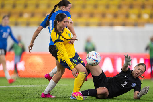 Filippa Sjöström of Sweden and goalkeeper Irina