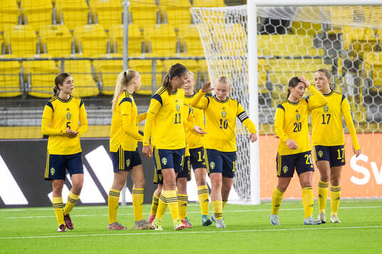 Players of Sweden celebrate