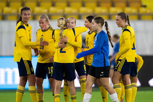 Players of Sweden celebrate