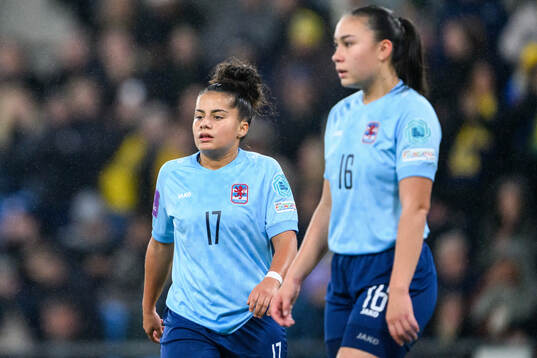 Caroline Jorge and Leila Schmit of Luxembourg look dejected