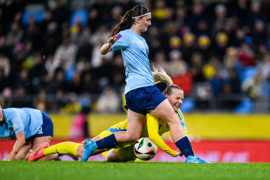 Stina Blackstenius of Sweden and Ana Barbosa Abreu of
