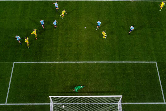 Julia Zigiotti Olme of Sweden scores 4-0 behind goalkeeper