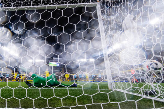 Filippa Angeldahl of Sweden scores 3-0 behind goalkeeper
