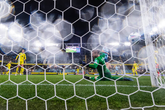 Stina Blackstenius of Sweden scores 5-0 behind goalkeeper