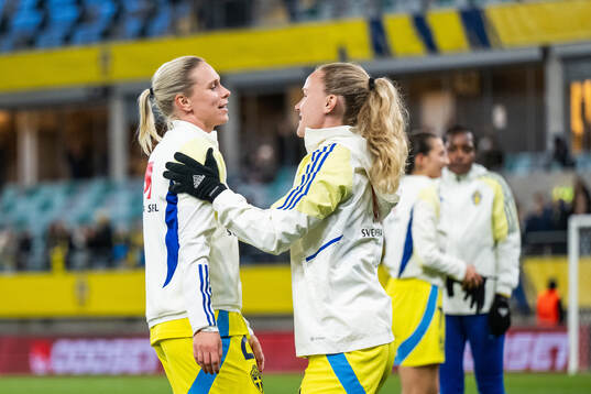 Jonna Andersson and Matilda Vinberg of Sweden celebrate