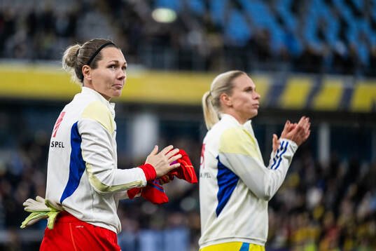 Goalkeeper Jennifer Falk and Jonna Andersson of Sweden