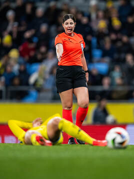 Referee Réka Molnar calls a penalty shot for Seden