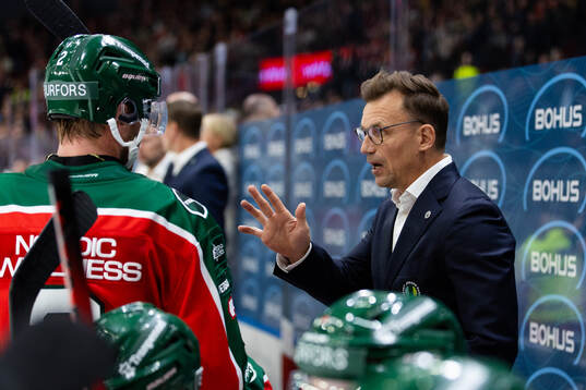 Frölundas Christian Folin och assisterande tränare