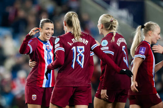 Celin Bizet Ildhusøy and Frida Maanum of Norway celebrate