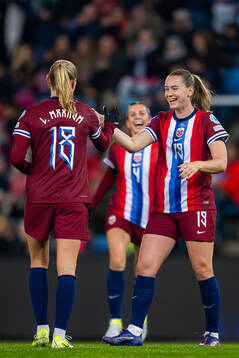 Frida Maanum of Norway celebrates with teammate Elisabeth
