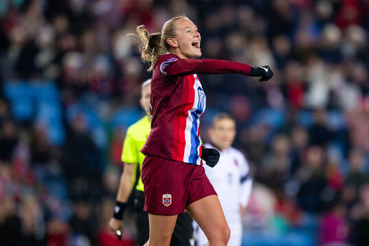 Frida Maanum of Norway celebrates scoring 5-0