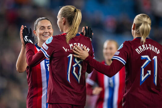 Frida Maanum of Norway celebrates with teammate Vilde Bøe