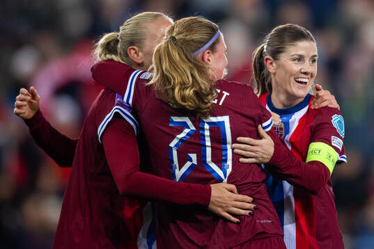 Signe Gaupset of Norway celebrates with teammate Maren
