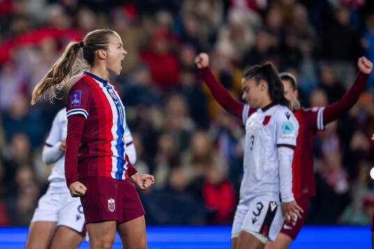 Guro Reiten of Norway celebrates