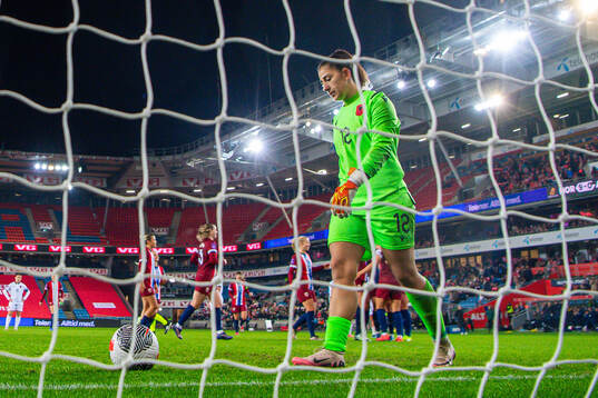 Goalkeeper Antigona Hyska of Albania looks dejected
