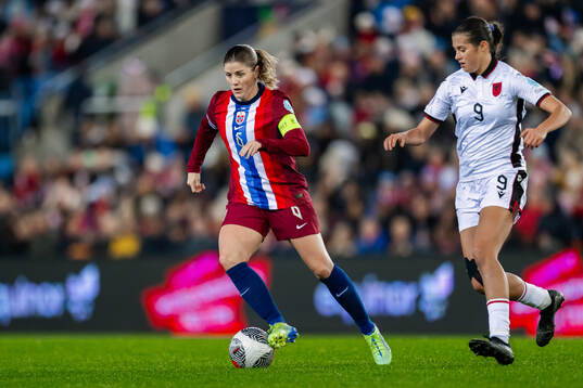 Maren Mjelde of Norway and Florentina Kuqi of Albania
