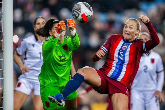 Goalkeeper Antigona Hyska of Albania and Guro Bergsvand of