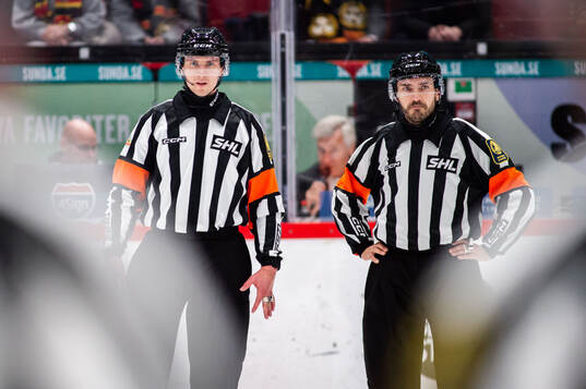 Domare Christoffer Holm och Domare Mattias Enroth