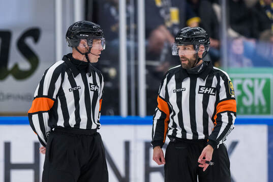 Domare Tobias Björk och Domare Marcus Linde