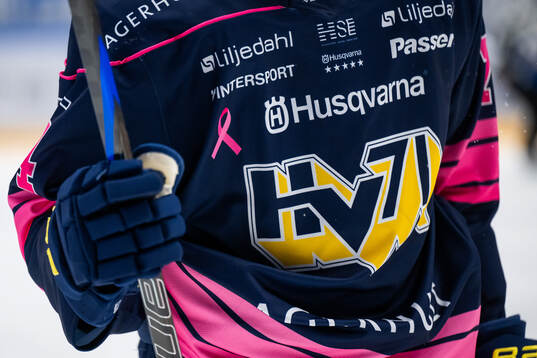 HV71 med en specialtröja för att stötta