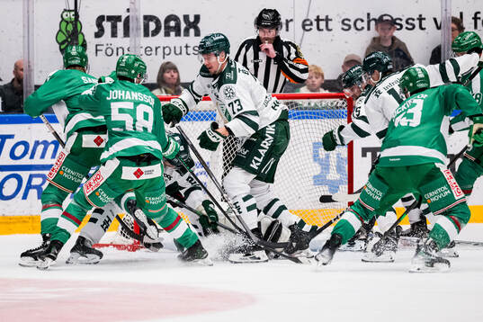 Rögles Filip Johansson och Färjestads Adam Ollas Mattsson