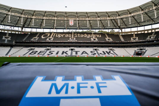 Besiktas Stadium and the Malmö FF team logo