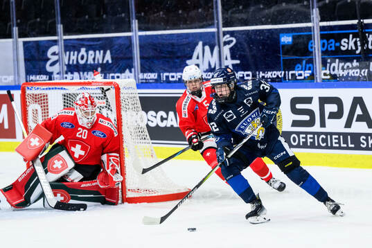 Goalkeeper Andrea Brändli and Lucie Tenenbaum of