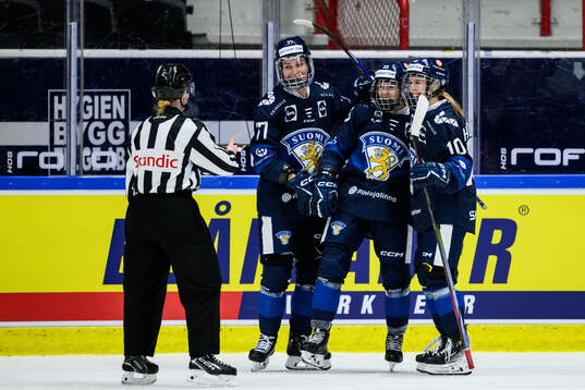 Susanna Tapani, Michelle Karvinen and Elisa Holopainen of