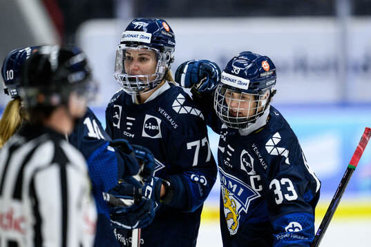 Susanna Tapani and Michelle Karvinen of Finland celebrates