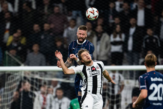 Pontus Jansson of Malmö FF and Semih Kilicsoy of Besiktas