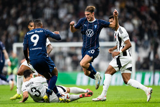 Gabriel Paulista of Besiktas against Isaac Kiese Thelin and