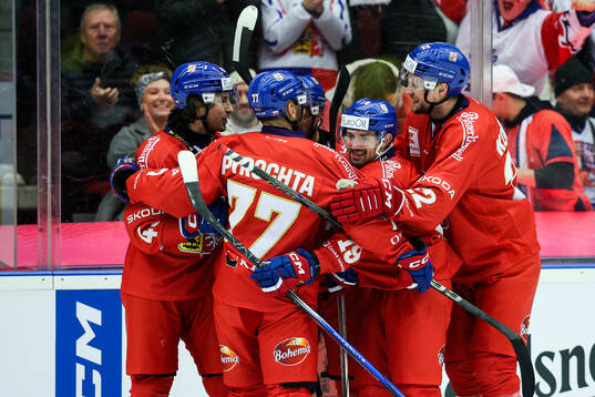Daniel Gazda of Czech Republic celebrates with eam mates