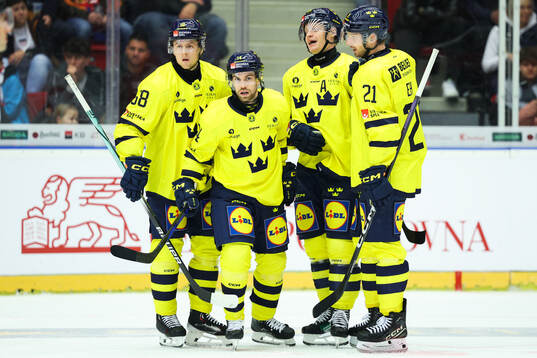 Oskar Lang of Sweden celebrates with Jesper Sellgren, Anton