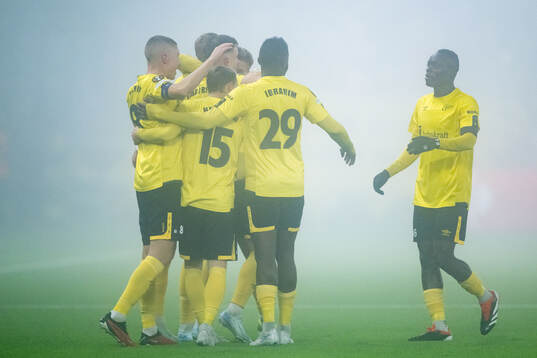 Emil Holten of Elfsborg celebrates with team mates