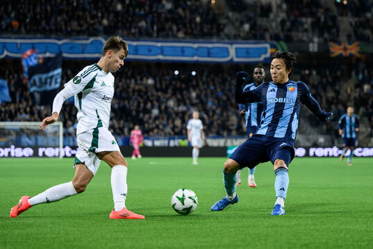 Giorgos Vagiannidis of Panathinaikos and Keita Kosugi of