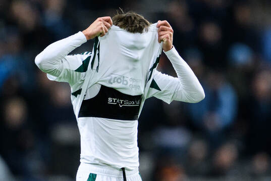 Giorgos Vagiannidis of Panathinaikos looks dejected