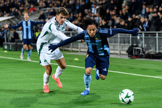 Giorgos Vagiannidis of Panathinaikos and Keita Kosugi of