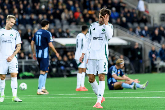 Giorgos Vagiannidis of Panathinaikos looks dejected