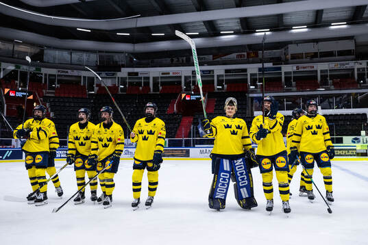 Players of Sweden celebrate