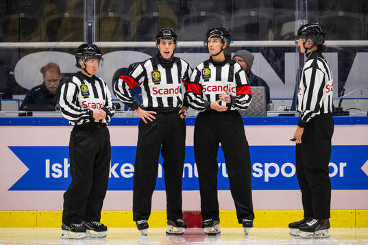 Linesman Kristyna Hajkova, Referee Veronica Lovensnö,