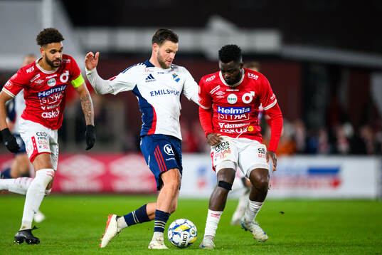 Östers Niklas Söderberg och Degerfors Aketchi Luc-Martin