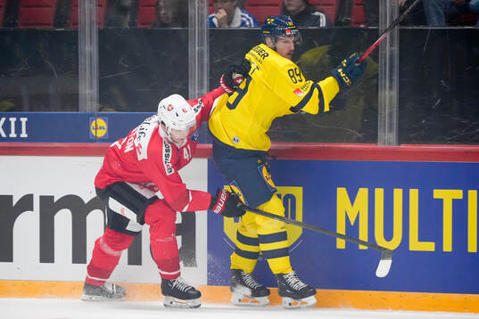 Giancarlo Chanton of Switzerland and Patrik Karlkvist of