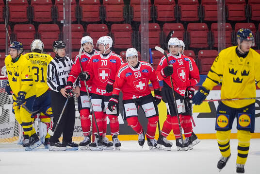Swiss players celebrating 2-2 goal
