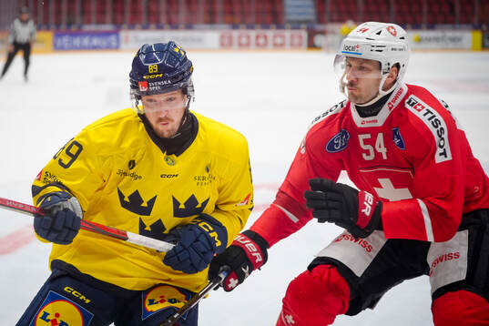 Patrik Karlkvist of Sweden and Christian Marti of