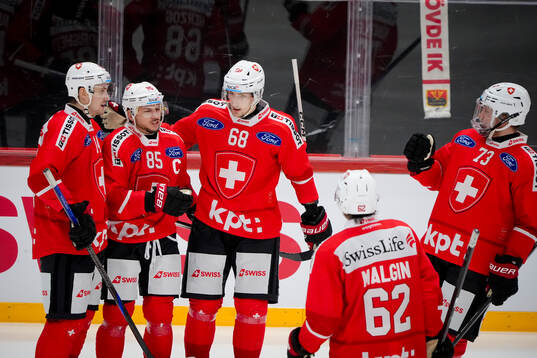 Swiss payers celebrating a goal